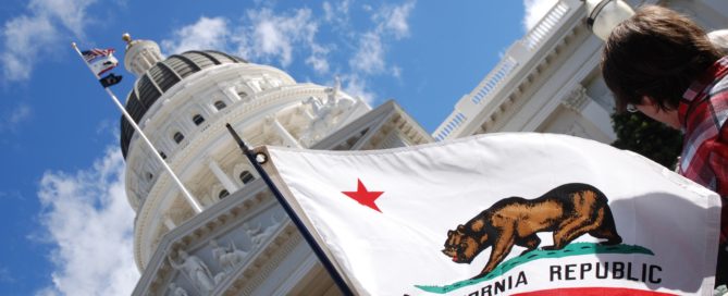 CA capitol building and flag