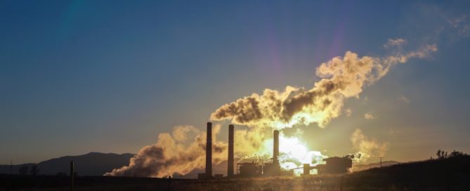 smoke stacks and sunset