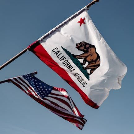 CA flag with bear and US flag