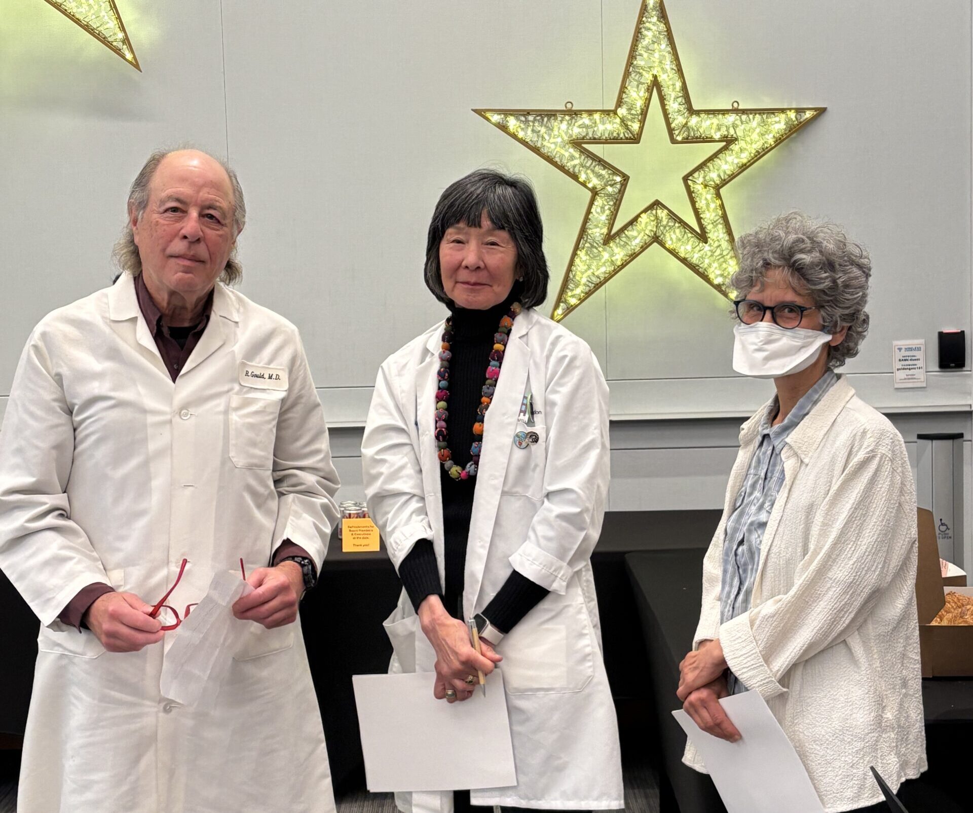 IMG_9357 three doctors standing in their white coats