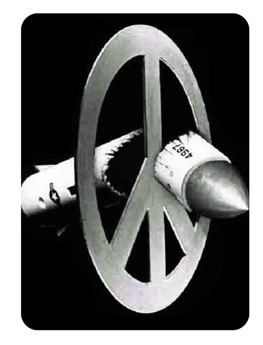 a peace symbol breaking a bomb in half